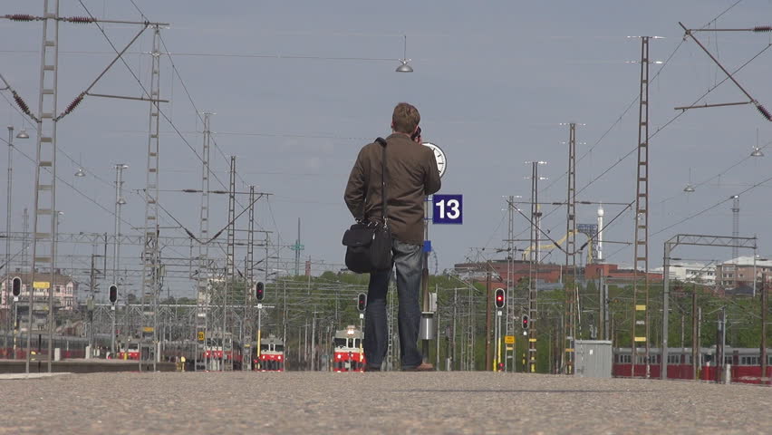 HELSINKI - JUNE 5: People wait for the modern trains on June 5, 2011 in Helsinki, Finland.
