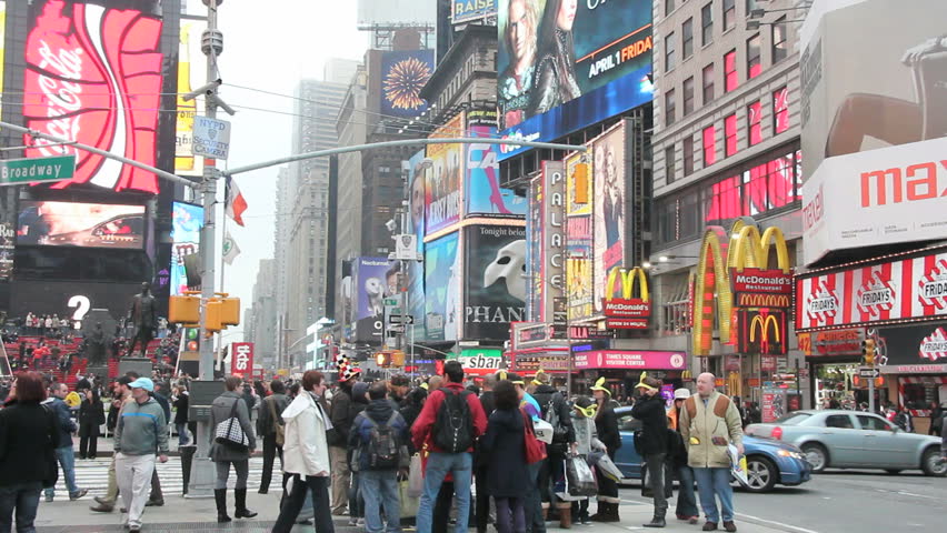 New York, New York, USA - April 14th : A small crowd of people gathered on the Times Square, NYC Manhattan downtown shown on 04/14/2011 in New York. 