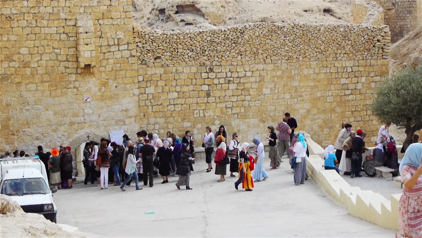 MAR SABA, PALESTINE -NOVEMBER 6: Pilgrims near Saint Savas monastery on November 6, 2011 in Mar Saba, Palestine. Mar Saba or Saint Savas monastery is the oldest monastery in Historical Palestine
