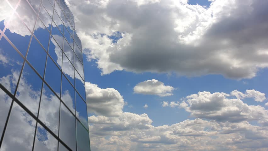 Office building cloud reflection. Time lapse
