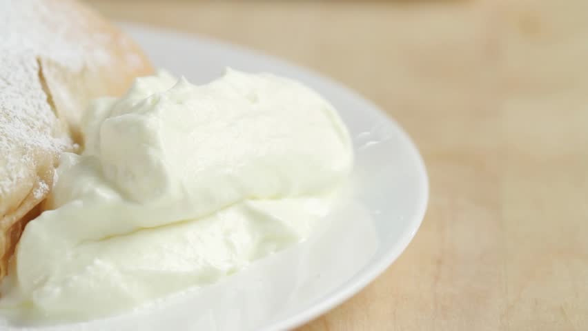 Apple strudel with cream