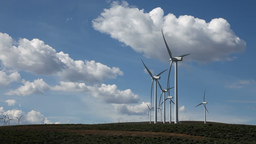 Stark White Electrical Power Generating Wind Turbines on Rolling Hills in Eastern Washington State, USA