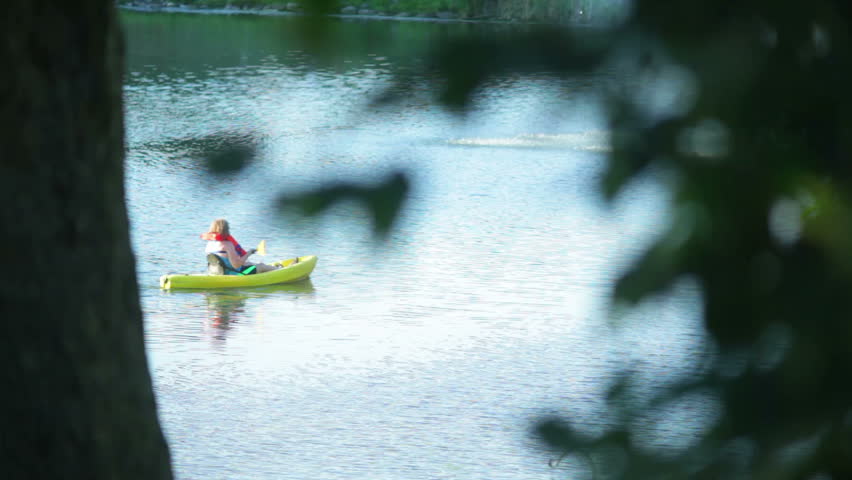 Kayaking or canoeing on a lake