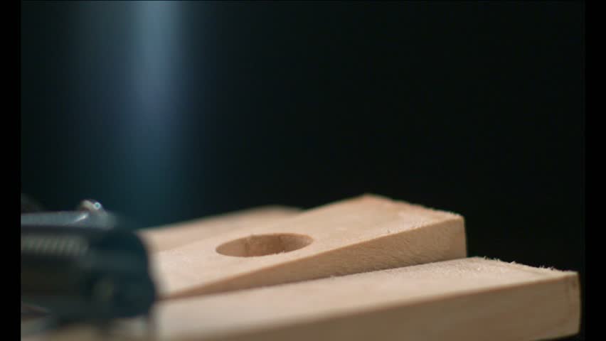 A lightbulb triggers a mousetrap
