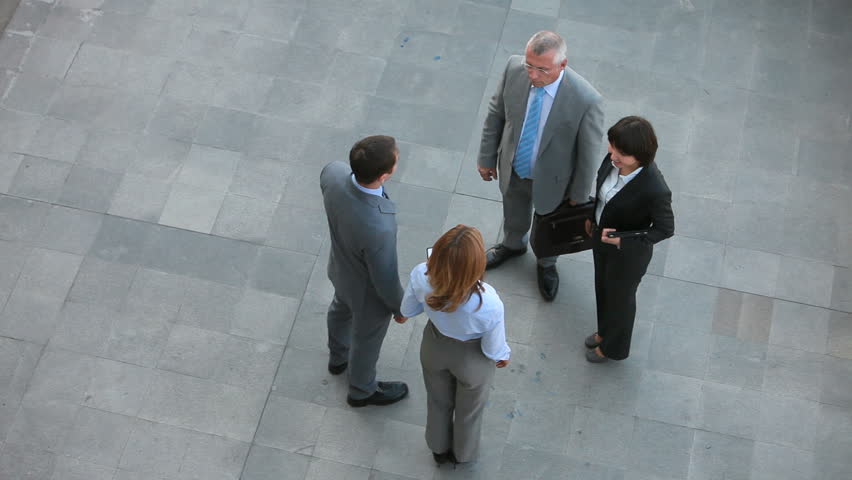 Business team with their leaders establishing long-term partnership