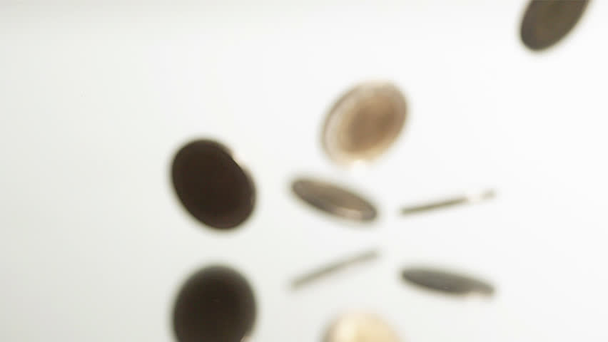 Studio shot of Euro coins falling against white background