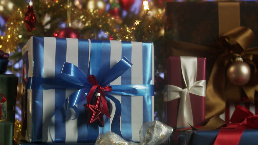 Presents by a Christmas tree.