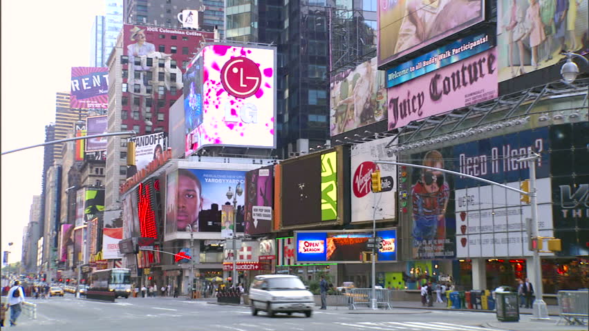 New York, NY - CIRCA 2006: Traffic goes down the street in Times Square during the day, when it is least crowded