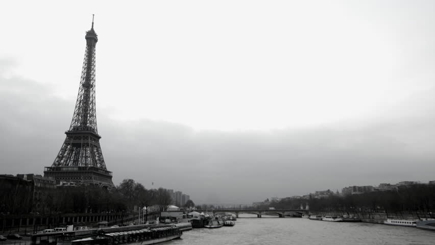 timelapse view of eifel tower and the river seine, paris, france