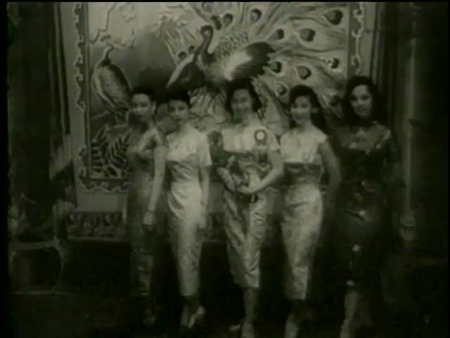 June Gong, the winner of Miss Chinatown USA contest, poses in San Francisco circa 1958 - MGM PICTURES, UNIVERSAL-INTERNATIONAL NEWSREEL, USA, filmed in 1958
