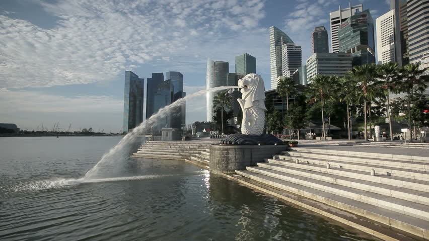 a shot of the Merlion Statue with the City Skyline in the background, Marina Bay, Singapore, South East Asia