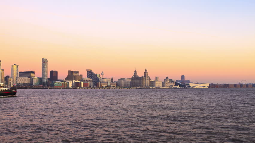Time lapse of the Mersey ferry then zoom into the Liverpool skyline