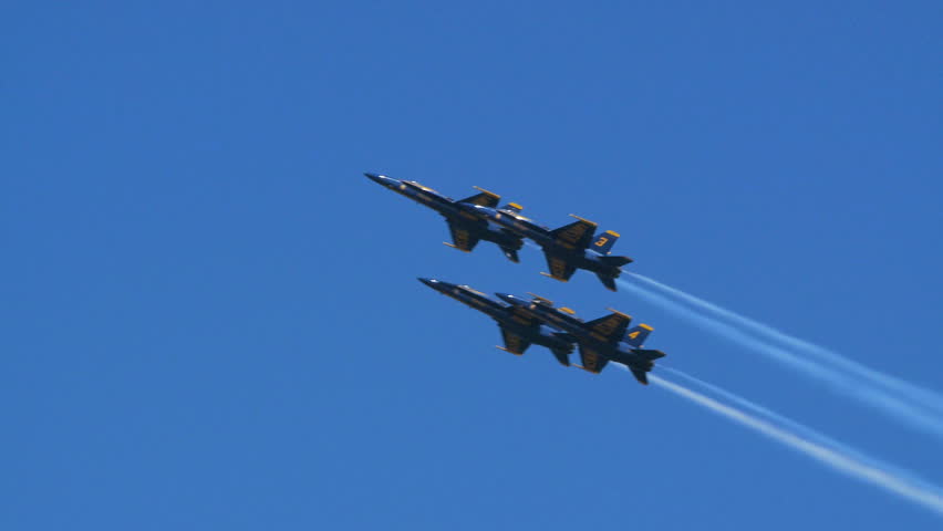 QUONSET, RHODE ISLAND - CIRCA JUNE 2012: Blue Angels - 2 four jets with smoke