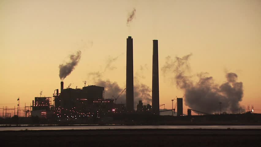 Silhouette of Industrial Plant Smokestacks