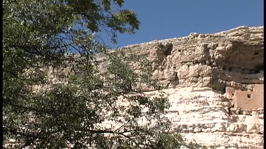A slow pan left to right across the famous "Montezuma's Castle" on the national monument of the same name in central Arizona