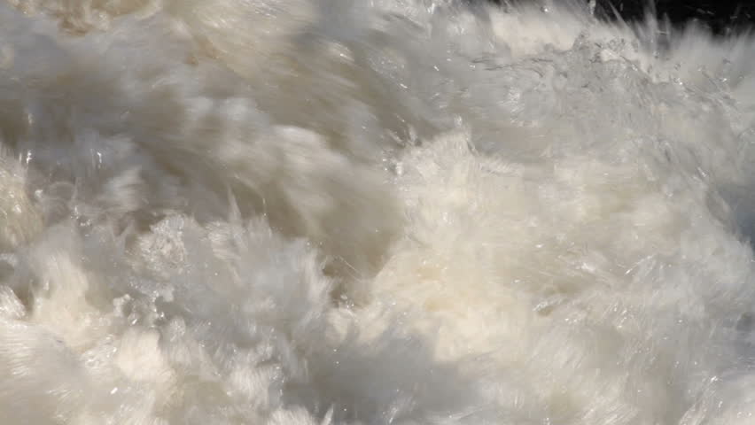 Turbulent water in fast river