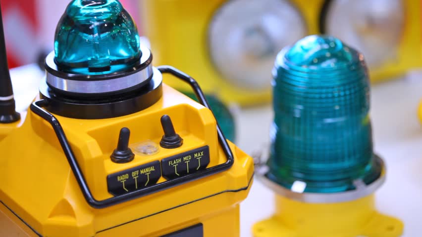 aviation radio beacon of yellow color blinks dark blue light