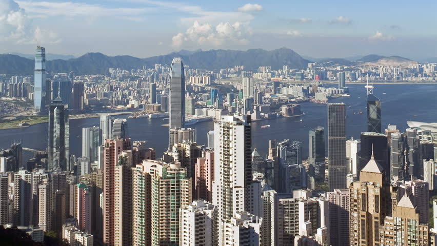 Hong Kong's Victoria Harbour with the skyscrapers of the financial and business district of Central on Hong Kong Island, China, Asia