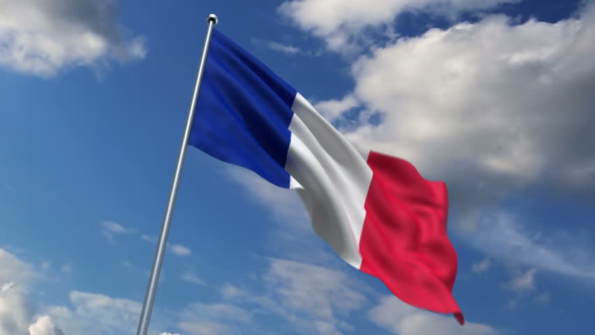 French flag waving against time-lapse clouds background