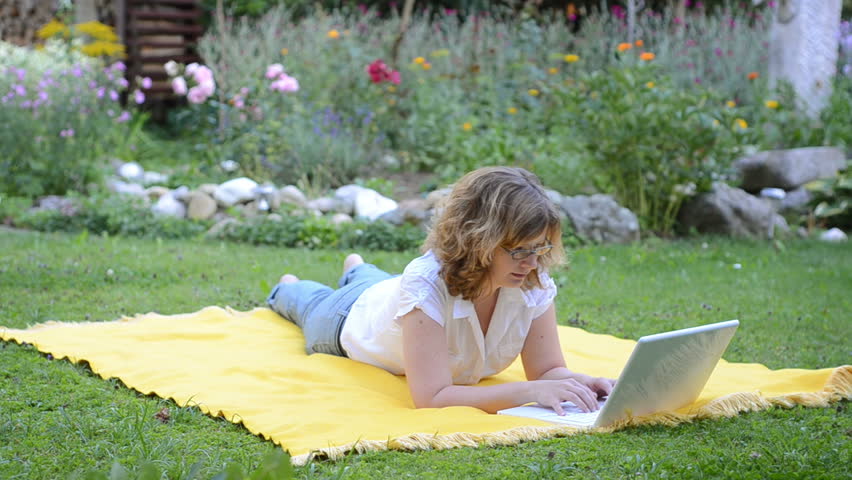 girl lies on a meadow