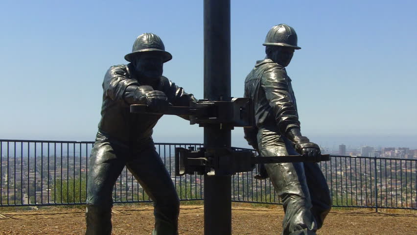 SIGNAL HILL, CA/USA - 08/05/2012 "Tribute To The Roughnecks" sculpture by Cindy Jackson evokes the petroleum industry in the 20th Century. Recorded on August 5, 2012- Signal Hill California.