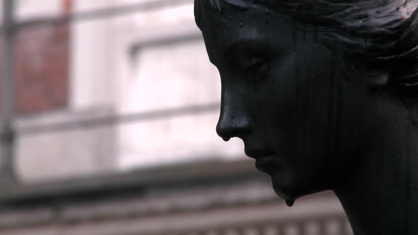 MILAN, ITALY-CIRCA 2011-A sculpture appears to be weeping.
