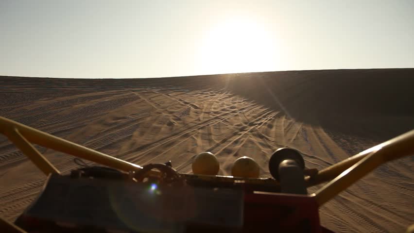 video footage of driving with a buggy off-road in the dunes of Ica, Peru