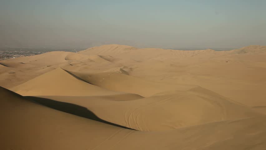 video footage of sand dunes in the desert 