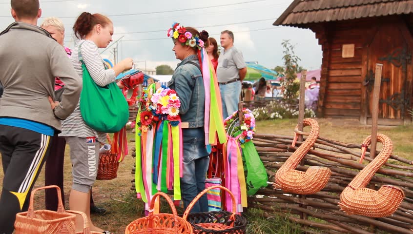 VELYKI SOROCHYNTSI, UKRAINE - AUGUST 17: People shop at the Sorochyntsy Fair on August 17, 2012 in Velyki Sorochyntsi, Ukraine. This large fair has been held every year since the end of Soviet rule and was declared Ukraine's national trade fair.