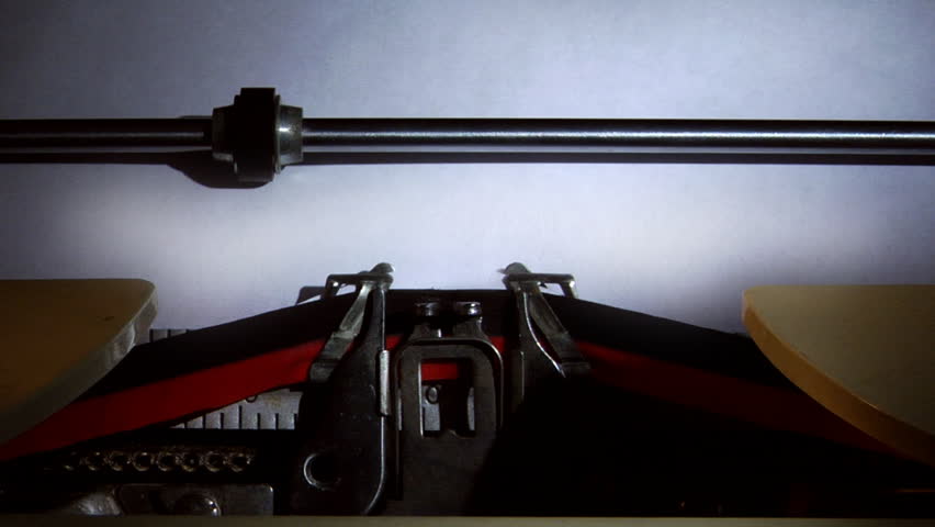 An old fashion typewriter typing on some paper 1080 HD video