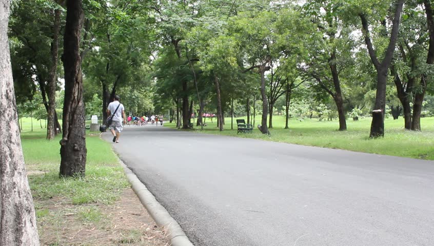Bangkok, Thailand - Circa August 2012 : People ride bicycles in the evening at Vachirabenjatas Park (Rot Fai Park).
