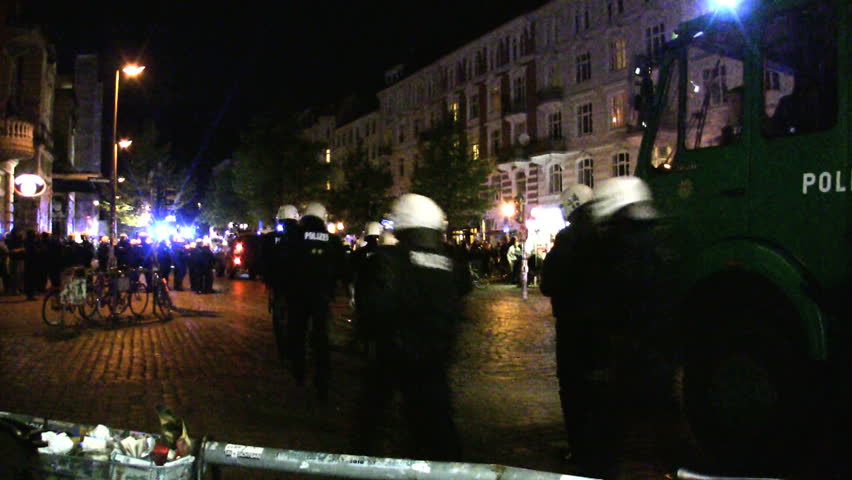 HAMBURG - CIRCA AUGUST 2012: Police operation circa August 2012 in the Schanzenviertel neighborhood of Hamburg, Germany. The peaceful Schanzenfest event ended in riots at night.
