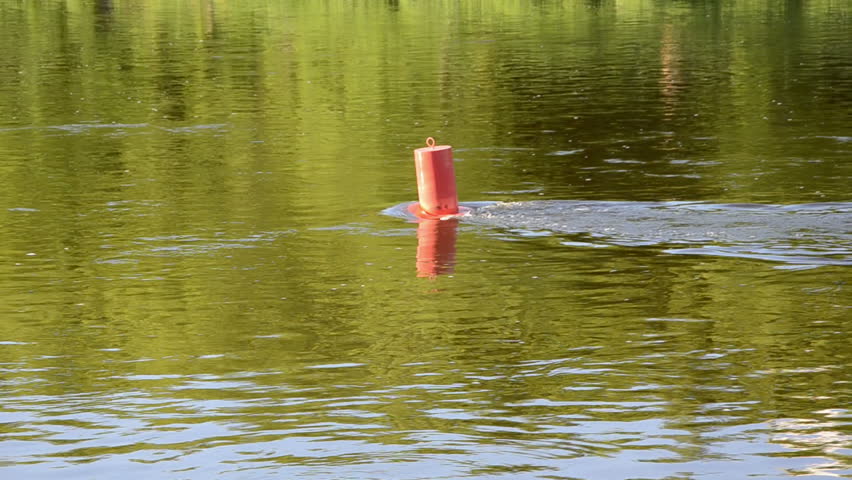 small  river waterway red beacon