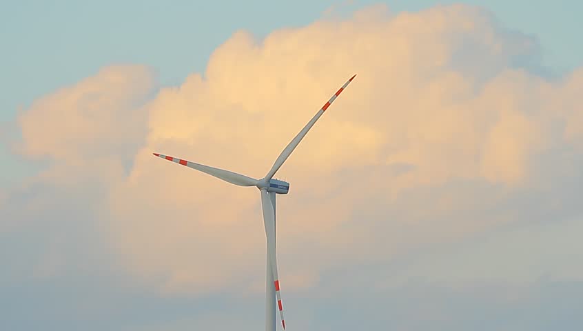 wind turbines on green field, alternative source of energy 