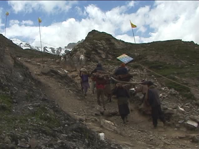 Porters carrying pilgrims to the holy Amarnath cave in the Himalayas