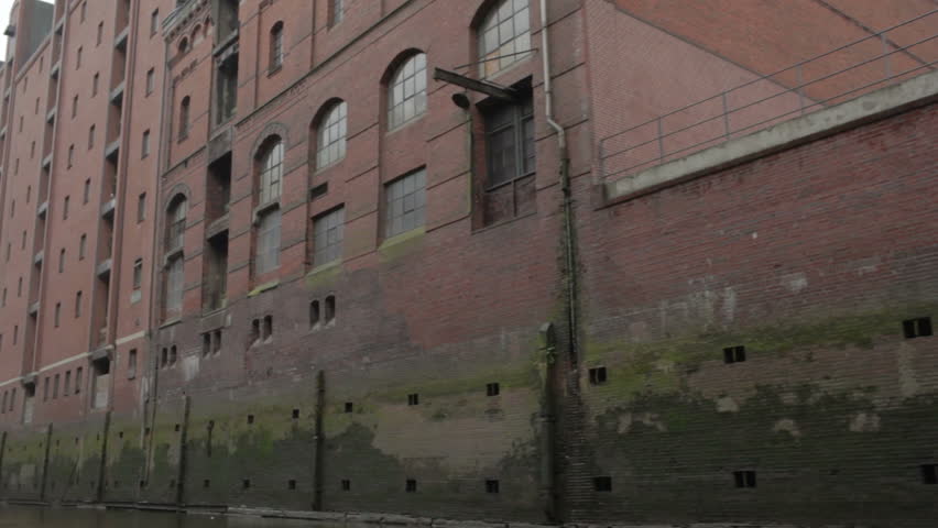 Sail along the buildings on the Elbe river in Hamburg.