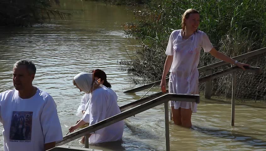 QASR AL YAHUD, ISRAEL â JANUARY 18: Greek Orthodox pilgrims baptize during the Epiphany at Qasr Al Yahud, Israel, January 18 2012