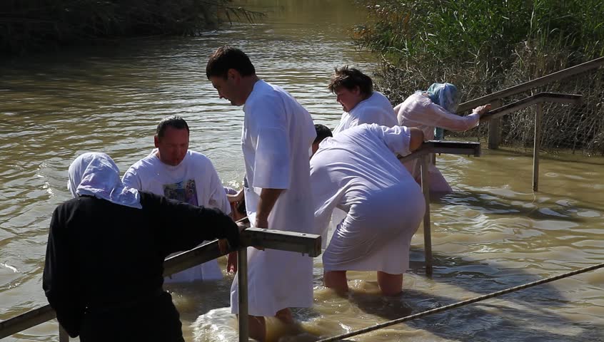 QASR AL YAHUD, ISRAEL â JANUARY 18: Greek Orthodox pilgrims baptize during the Epiphany at Qasr Al Yahud, Israel, January 18 2012