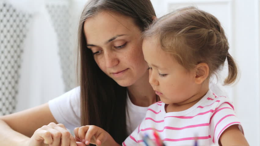 A Mother Licks Her Daughters Cheek For A Picture And The Girl Wipes Off Her Face Stock Footage