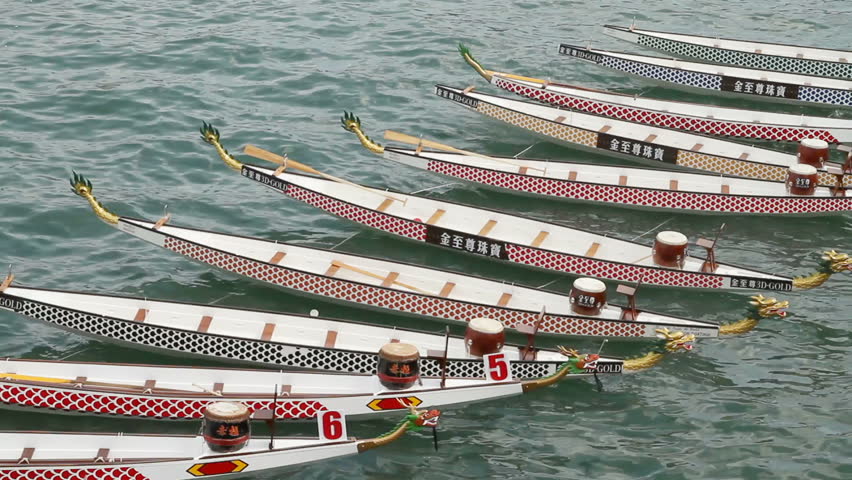 HONG KONG - JUNE 18: Dragon boats on Victoria Harbor in Hong Kong International Dragon Boat Races. shot on June 18, 2011 in Hong Kong, China.