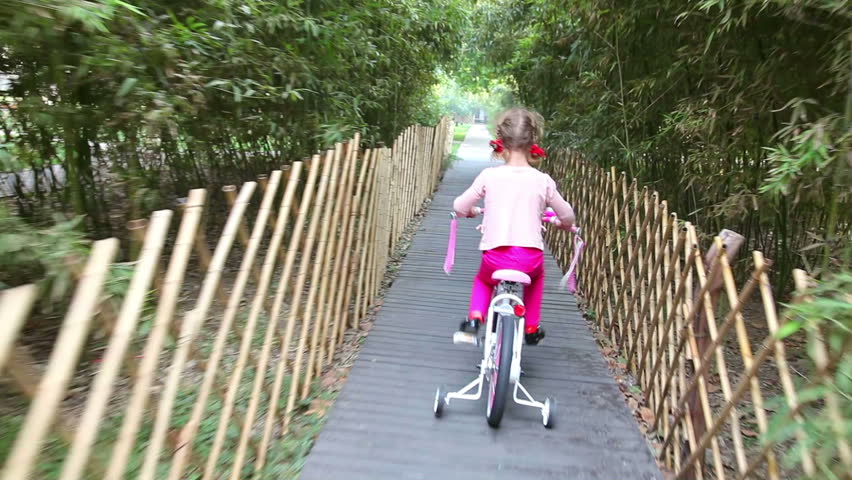 Little girl on bike