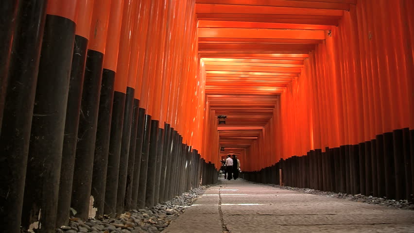 KYOTO, JAPAN - CIRCA 2012: Fushimi Inar Temple Torii slide backward