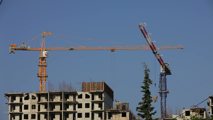 Process of construction of a residential house. Time lapse.
Constructing a building.