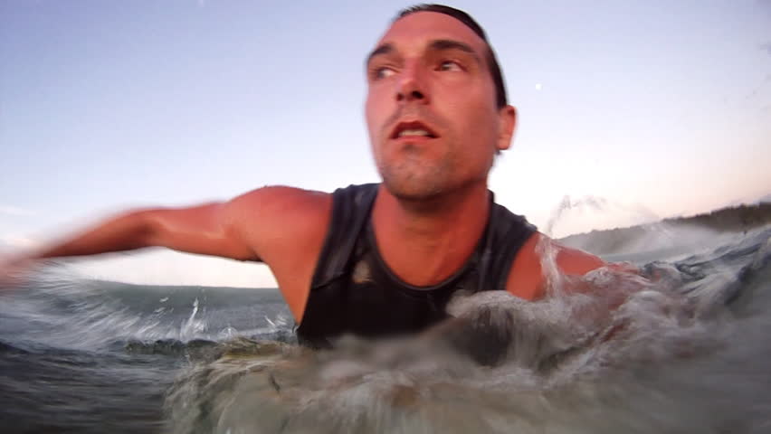 Dangerous Waves Crashing the Surfer