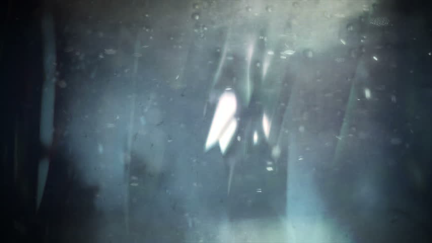 Underwater ambiance scene punctuated by soft glows of warm light. Computer generated images. Loops perfectly.