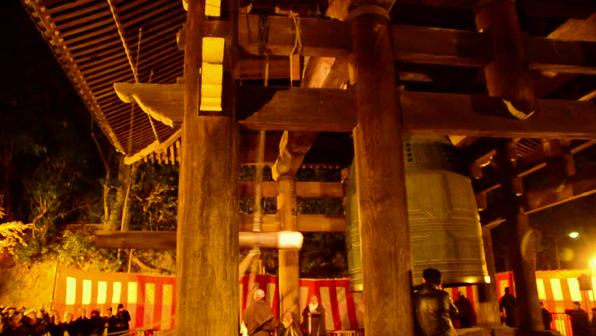 Kyoto - January 2012: Temple bell ringing at Chion-in in Kobe at new years eve with monks on January 01, 2012 in Kyoto, Japan