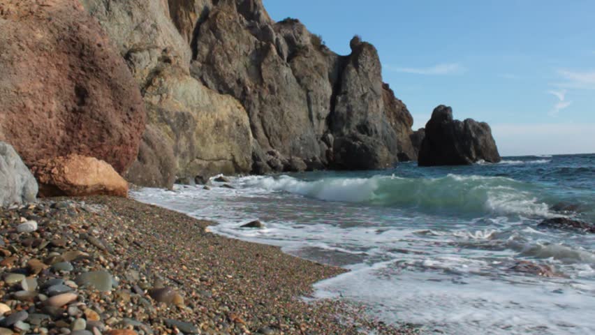 Waves crashing on rocks at low tide (Black Sea, Crimea)