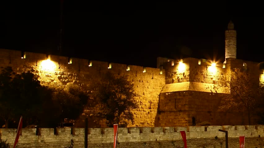JERUSALEM, ISRAEL - NOVEMBER 01: Drivers, commuters and tourists hurry to their destinations during rush hour near the wall of Jerusalem, time lapse view, Israel, 01 November 2012