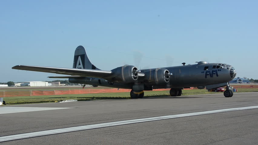 LAKELAND - APRIL 1: Legendary World War II era B-29 bomber warms up engines in Lakeland, FL on April 1, 2012. The bomber will depart to its home airport in Texas.