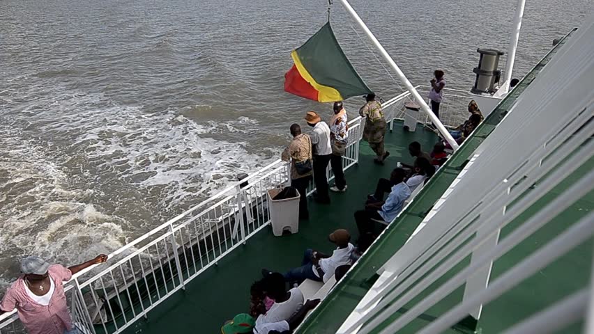 ZIGUINCHOR, SENEGAL - SEPTEMBER 29: Passengers aboard the new ferry between Ziguinchor and Dakar on September, 29 2012 in Ziguinchor, Senegal. The old ship sank in 2002, killing at least 1,863 people.